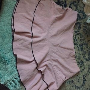Light pink ruffle mini skirt